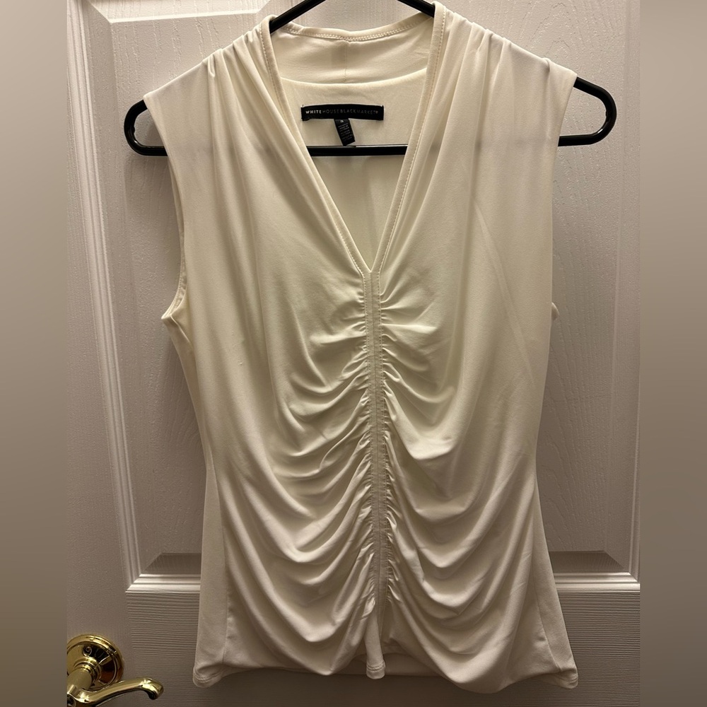 WHBM sleeveless, cream blouse with ruching center seam.  Size Small.
